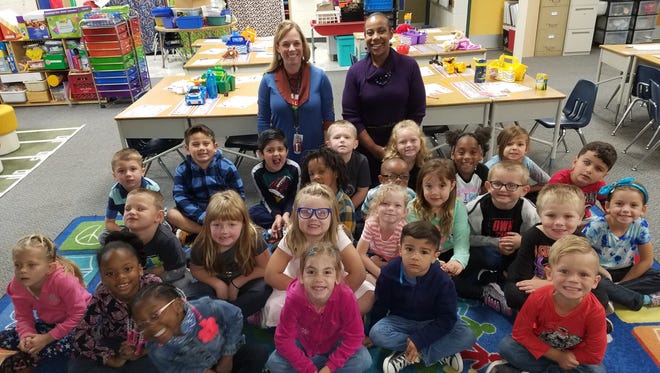 Wayne-Westland Schools Superintendent Shelley Holt (standing right rear) with a class at P.D. Graham Elementary School