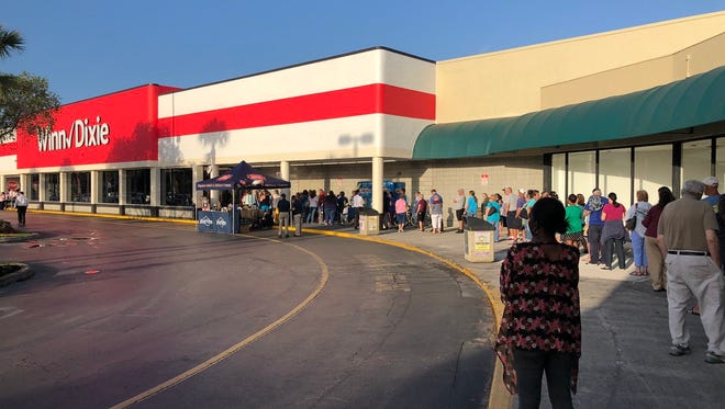 A line was forming at the remodeled Fort Pierce Winn Dixie for a gift card giveaway.