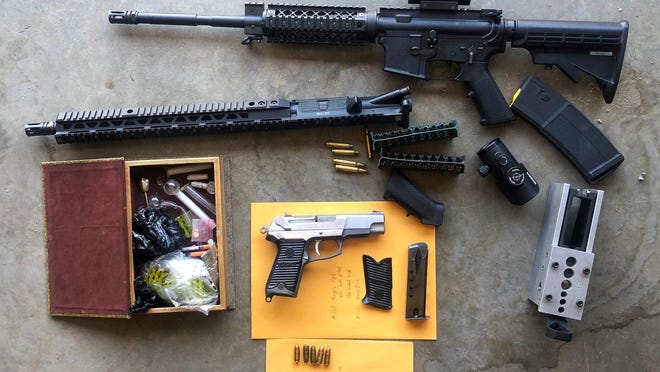 Items including firearms, a jig used for making ghost guns and drug paraphernalia were recovered during a search warrant served in Barstow on Wednesday, July 29, 2020.
