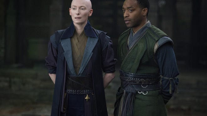 Tilda Swinton, left, and Chiwetel Ejiofor appear in a scene in “Doctor Strange.”