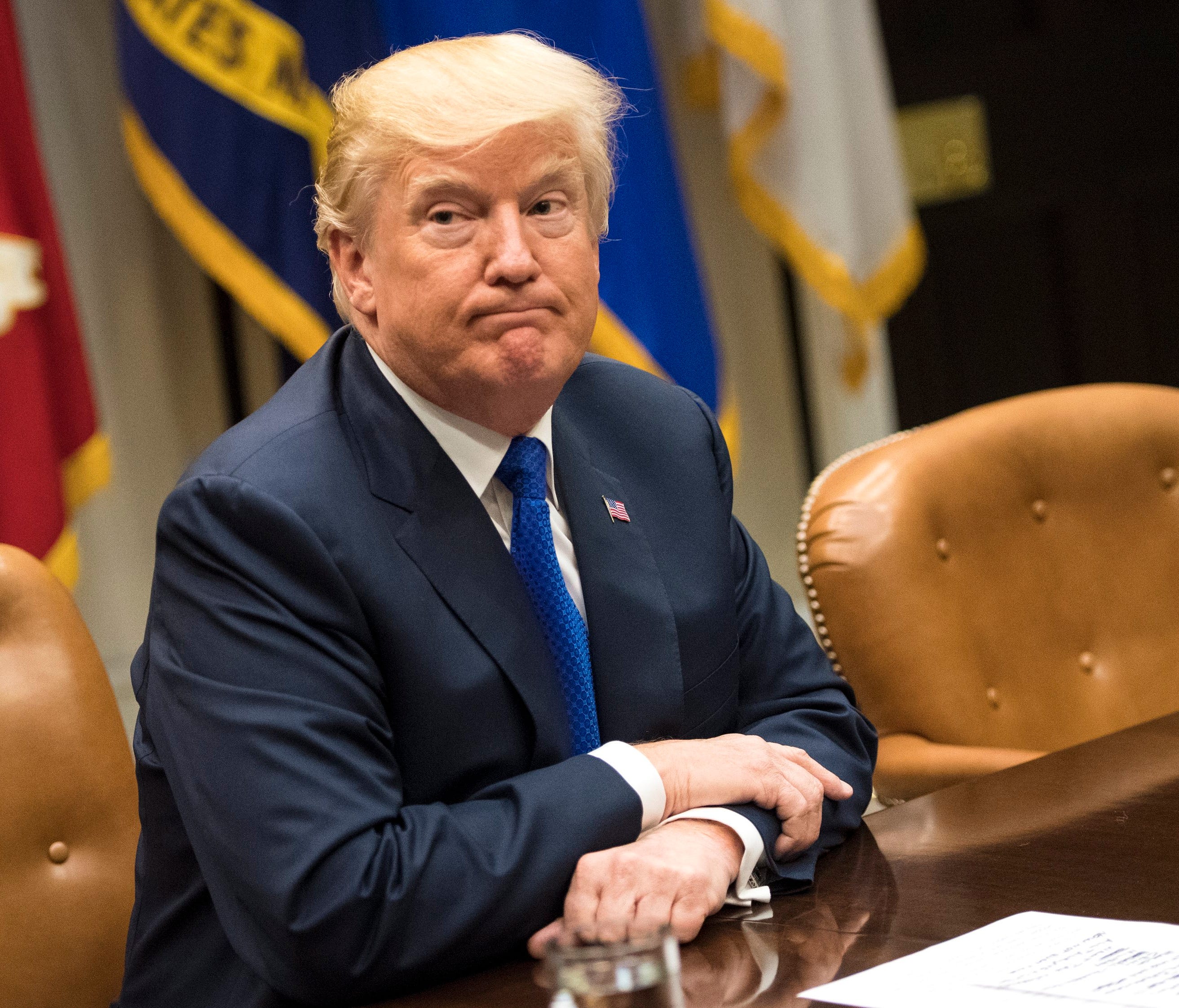 President Trump is pictured speaking to reporters during a meeting with congressional leadership in the White House.