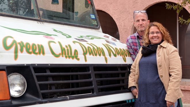 Owners Patrick "Paddy" and Janet Payne in front of their Green Chile Paddy Wagon food truck.