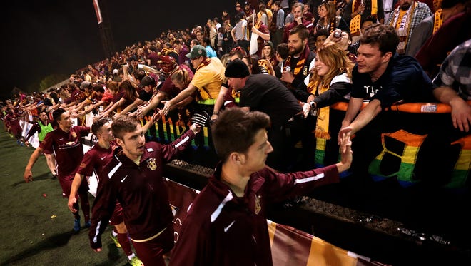 Detroit City FC players thanks the fans after their home opener against AFC Ann Arbor during DCFC on Friday, May 20, 2016, at the new Keyworth Stadium in Hamtramck, MI. 
