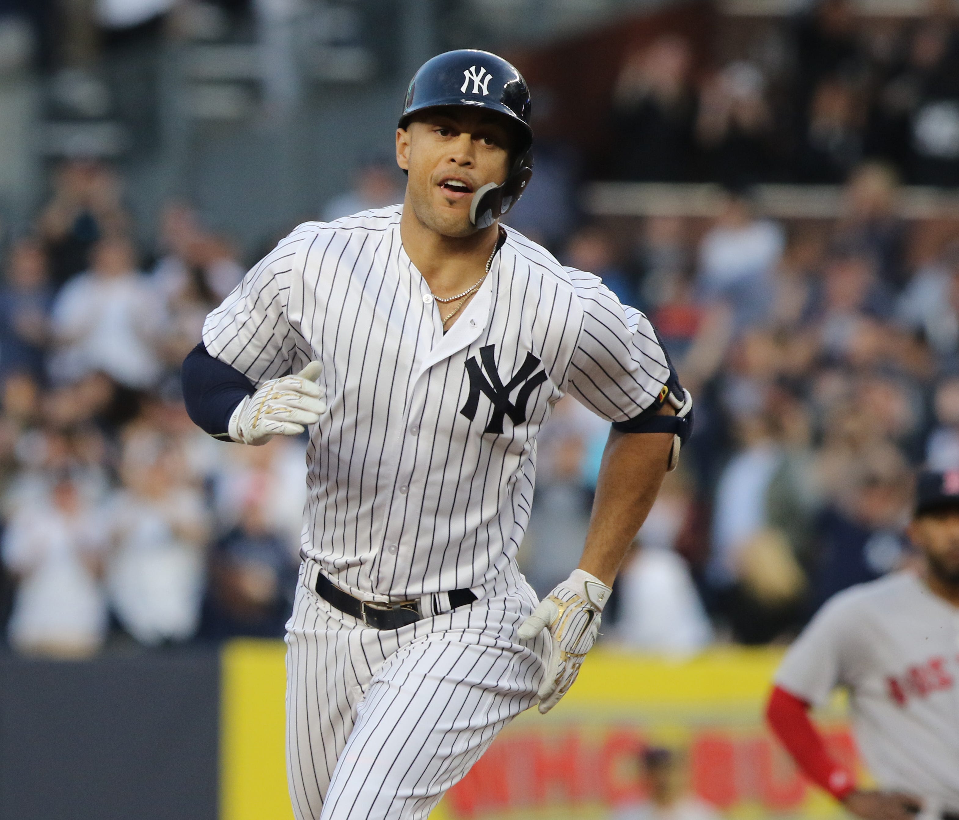 Giancarlo Stanton rounds second after he hit a solo home run in the second inning.
