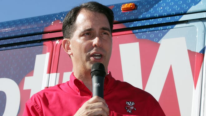 Wisconsin Gov. Scott Walker speaks during a campaign stop at Republican Party headquarters in Sheboygan on Saturday.