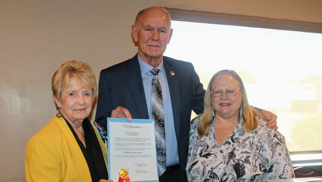 Alamogordo Mayor Richard Boss stands with White Sands Chapter of the Daughters of the American Revolution (DAR) Regent Marda Seldman (left) and DAR member and Constitution Week Chairwoman Cynthia Heithold (right). Boss proclaimed Sept. 17 to 23 as Constitution Week in Alamogordo Monday.