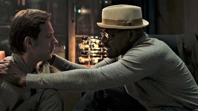 James D'Arcy and Delroy Lindo try to make their way through a ravaged near-future.