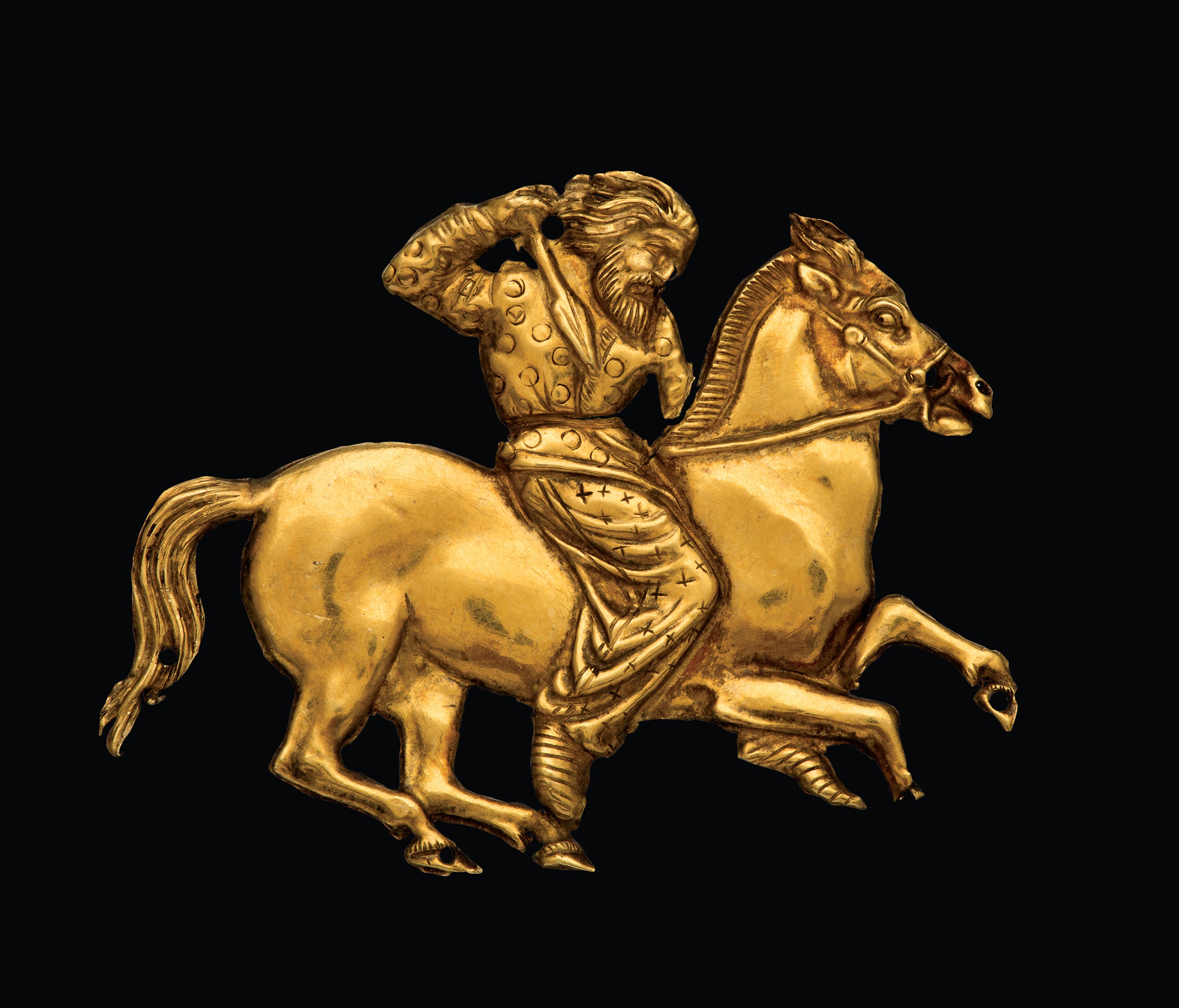 A gold plaque depicting a Scythian rider with a spear in his hand. A major loan came from the State Hermitage Museum in St. Petersburg, along with loans from several other museums, that contributed to the 200 objects in the British Museum exhibition,