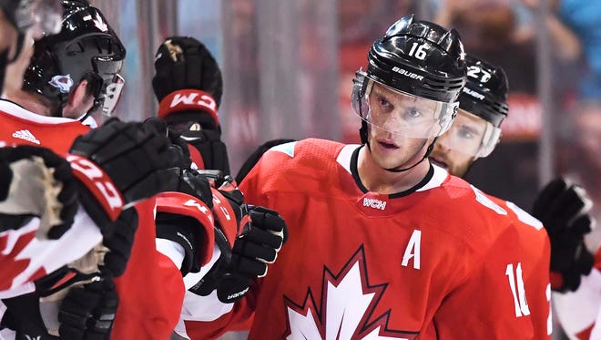 Team Canada's Jonathan Toews celebrates his second goal of the game against Team Europe with teammates on the bench during the second period of a World Cup of Hockey game in Toronto on Wednesday.