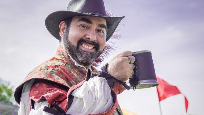 A thirsty reveler enjoys a pint of beer at a recent Renaissance ArtsFaire. The Dragon's Eye Tavern, featuring local beer and wine, returns to RenFaire, taking place this weekend at Young Park.