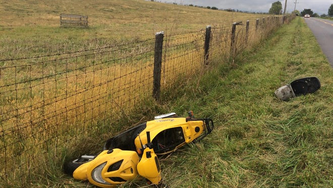 A motorcycle lies wrecked off of Va. 608 after the driver ran off the road there on Sept. 29, 2016 in Fishersville, Virginia.