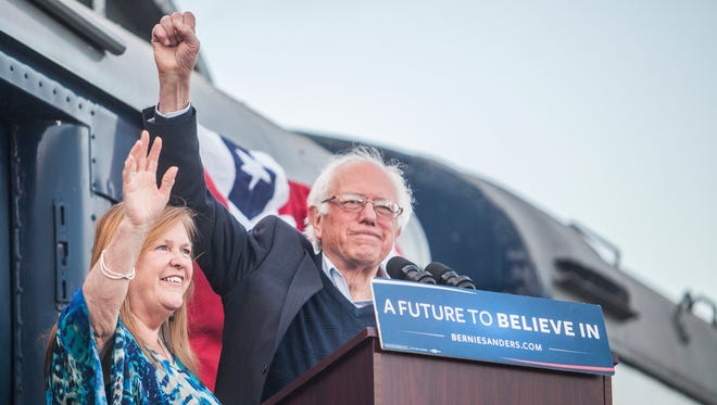 Democratic presidential candidate Bernie Sanders and his wife, Jane, wave to the crowd at the L&N Train Depot in Bowling Green, Ky., on Saturday, May 14, 2016.