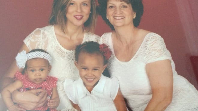 Marie Nelson with daughter Jessica Cramer-Isaacs and granddaughters Ariana and Amelia Isaacs.
