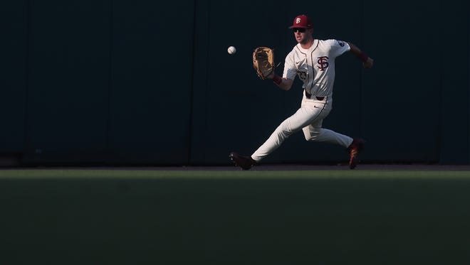 FSU's Reese Albert fields a ball in centerfield against Jacksonville at Dick Howser Stadium on Wednesday, May 9, 2018.