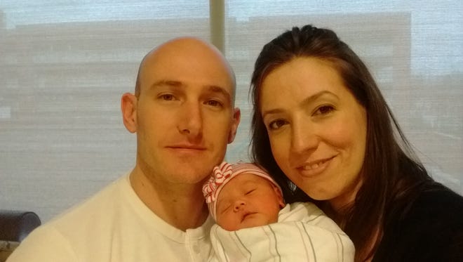 Zofia Lorraine Tomos, seen here with her parents, Peter and Nicole, of the Hewitt section of West Milford, was the first baby born in 2017 at Morristown Medical Center.
