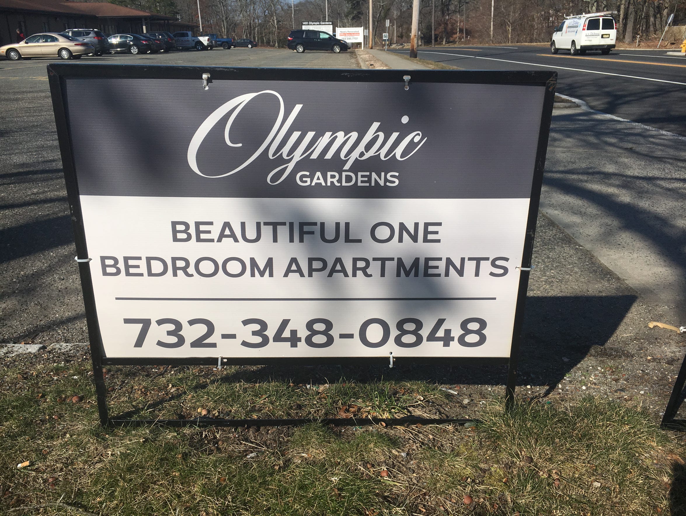 The sign outside Olympic Gardens, the 80-unit complex