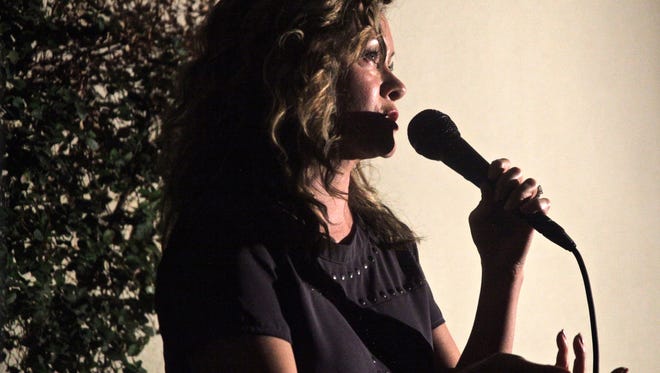 Lee Rice shares her story during the first Coachella Valley Storytellers Project event at the Catalan in Rancho Mirage on Monday.