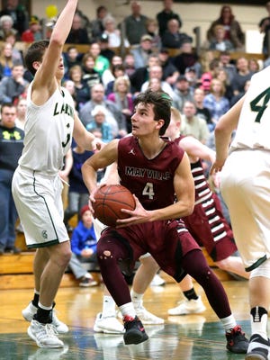 Mayville High School boys basketball's Emmit Hurtienne eyes up the basket against Laconia High School's Reed Gunnink during their game Friday, February 16, 2018, in Rosendale. Doug Raflik/USA Today NETWORK-Wisconsin