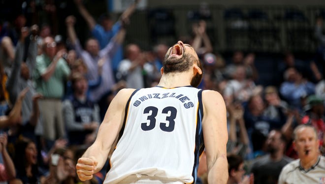 Memphis Grizzlies Marc Gasol celebrates his three point basket during overtime against the Washington Wizards at FedExForum.