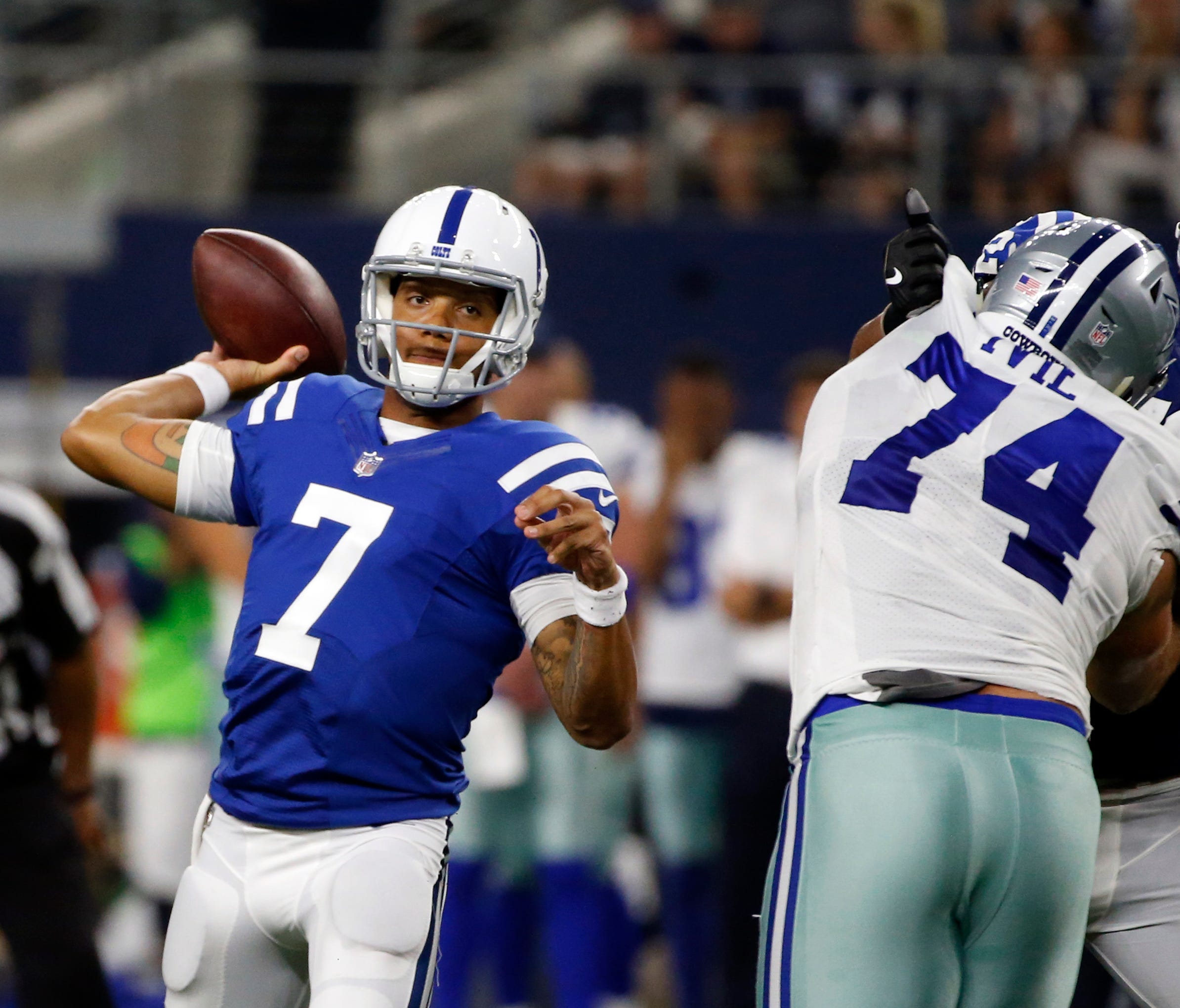 Indianapolis Colts quarterback Stephen Morris (7) throws a pass under pressure from Dallas Cowboys defensive tackle Joey Ivie (74) during the second half of a preseason NFL football game, Saturday, Aug. 19, 2017, in Arlington, Texas. (AP Photo/Michae