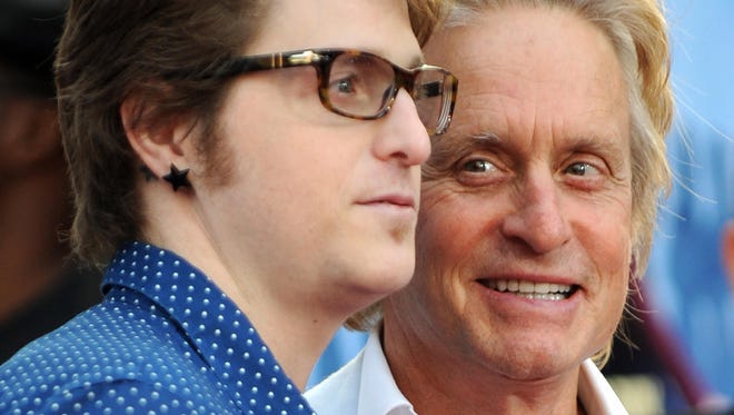 Michael Douglas arrives with his son Cameron Douglas for the world premiere of "Ghosts of Girlfriends Past" at the Grauman's Chinese Theater in Hollywood, California on April 27, 2009.