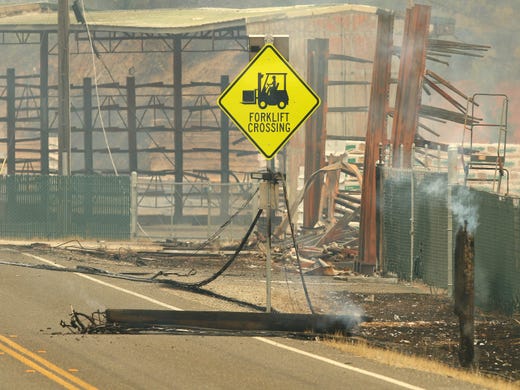 These photos point to the aftermath of the Carr Fire in