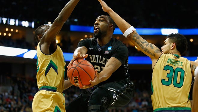 Roosevelt Jones of the Butler Bulldogs puts up a shot in front of Zach Auguste #30 of the Notre Dame Fighting Irish in the first half during the third round of the 2015 NCAA Men's Basketball Tournament at Consol Energy Center on March 21, 2015 in Pittsburgh, Penn.