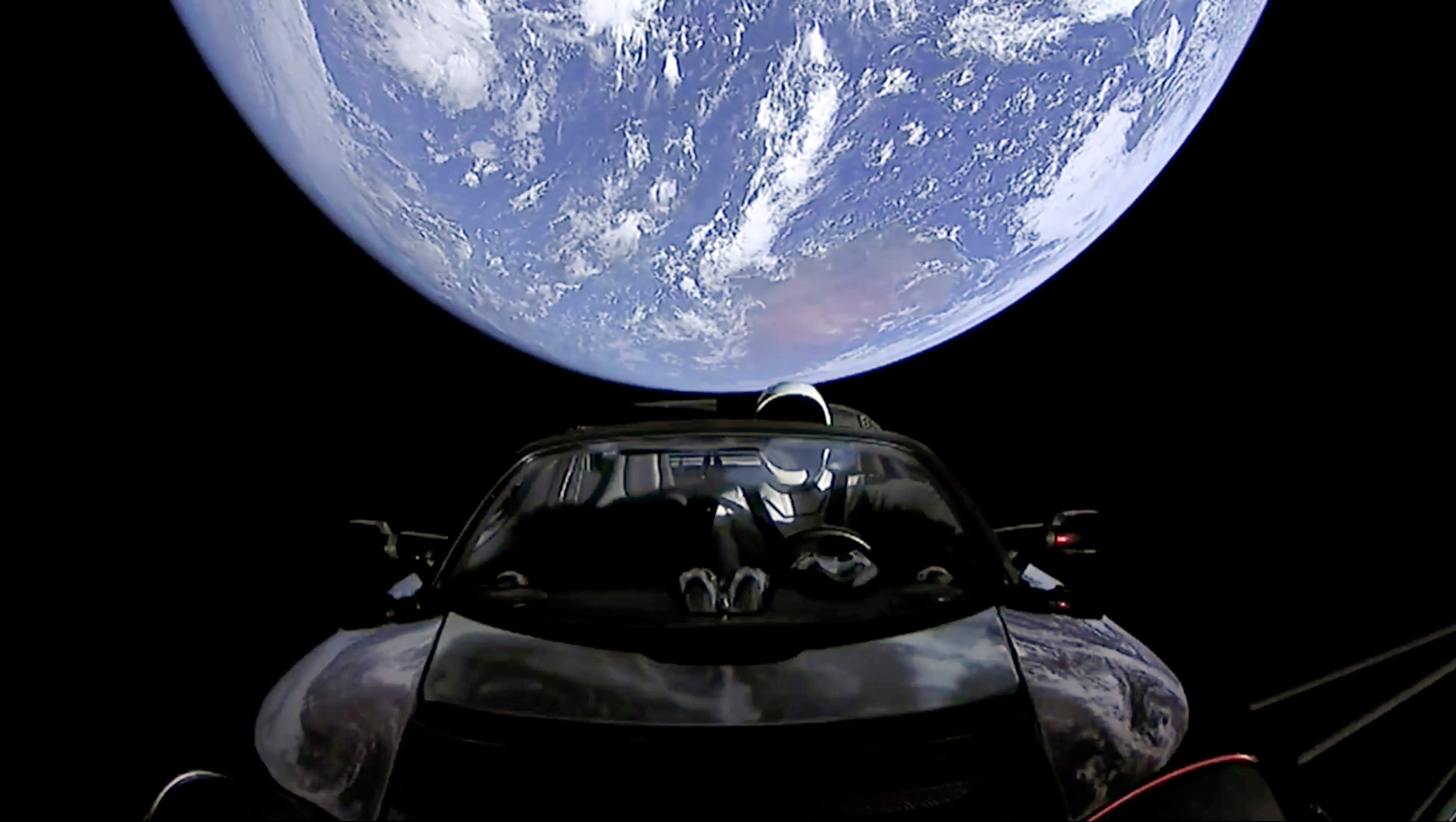 Elon Musk Shares Last Mage Of Starman Cruising Into Outer Space
