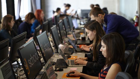Would-be technology workers learn coding and...