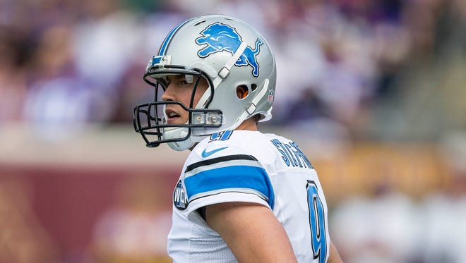 Sep 20, 2015; Detroit Lions quarterback Matthew Stafford (9) looks on during the first half against the Minnesota Vikings at TCF Bank Stadium.