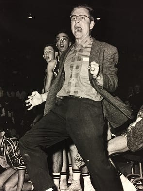 Lewisville coach Bob Scott watching ace Marion Pierce