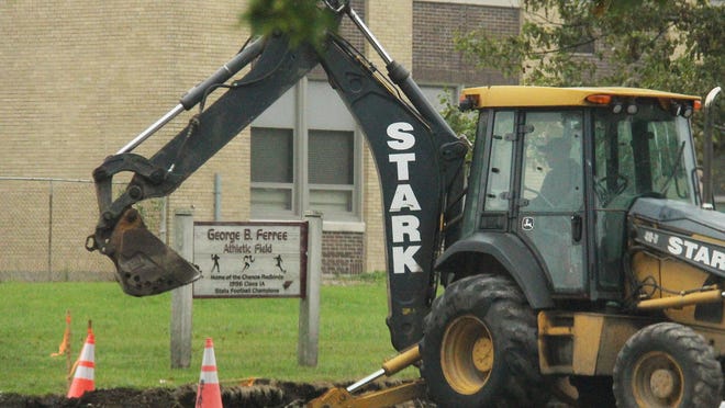 A backhoe digs up dirt along South Division Street near the grade school in Chenoa Thursday morning. This is part of the Division Street Project for McLean County being done by Stark Construction of Bloomington-Normal.