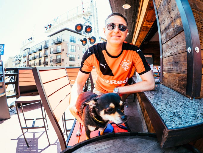 Samuel Burt, 39, and his dog Squirt, enjoying the weather