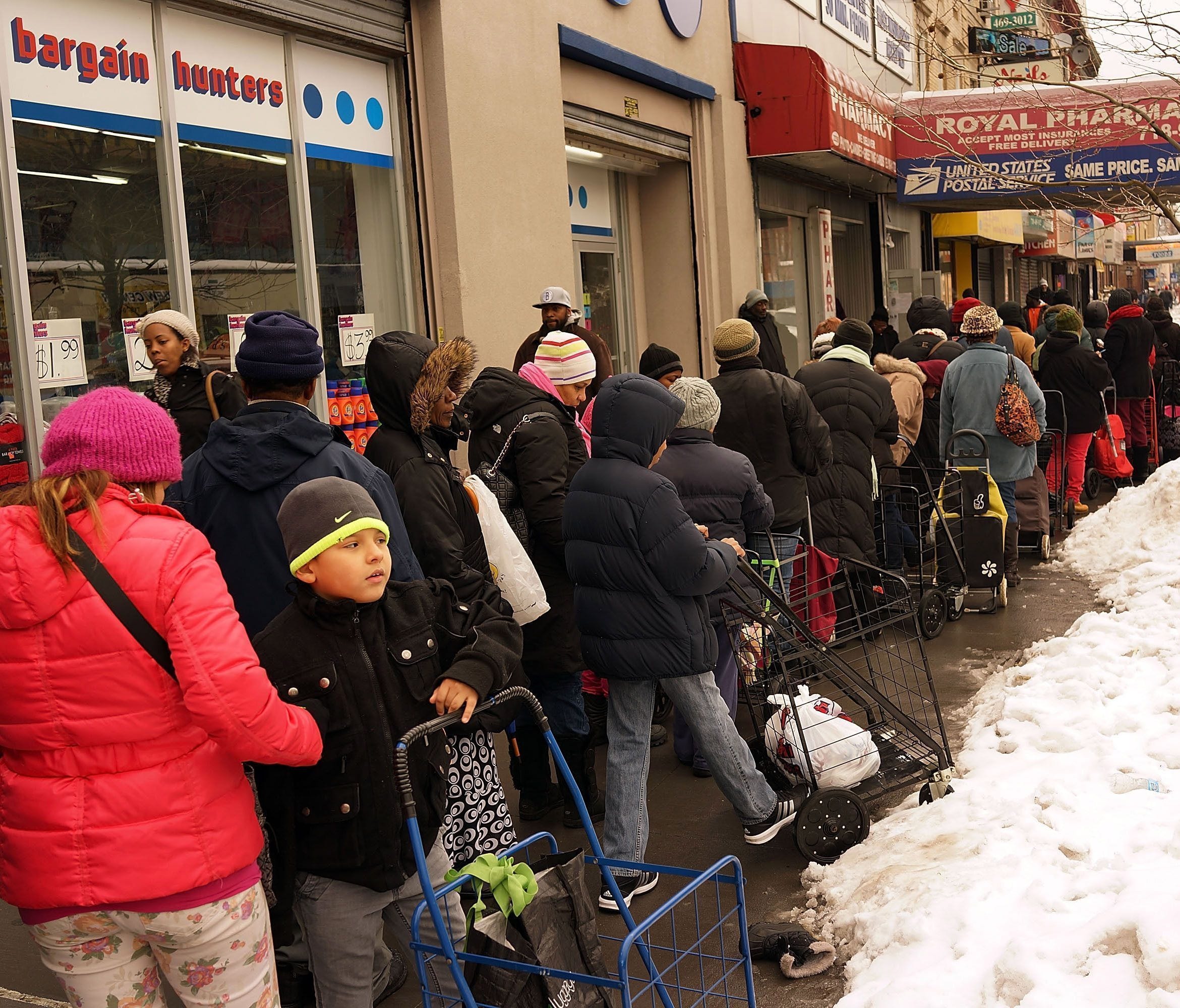 People wait in line for food in Brooklyn on Feb. 18, 2017.