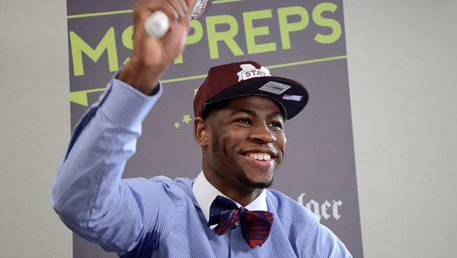 Malik Newman rings a cowbell Friday, April 24, 2015 after announcing that he'll play basketball at Mississippi State University.