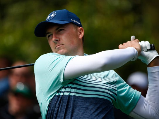 Jordan Spieth hits his tee shot on the 7th hole during