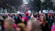Demonstrators march on the National Mall in Washington,