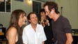 Guitarists greet guitartist... Malcolm Young, left,
