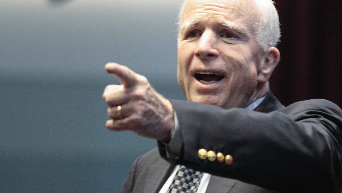 U.S. Sen. John McCain reacts at The Sandra Day O'Connor