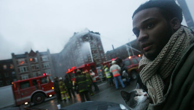 A fire comsumed a 100 year old apartment building named the Forest Arms at Second Avenue and Forest in the Wayne State area Wednesday, Feb. 6, 2008.