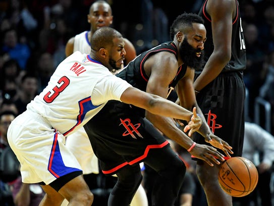LA Clippers guard Chris Paul (3) reaches for the ball