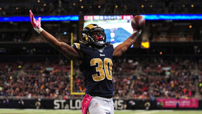 Oct 25, 2015: St. Louis Rams running back Todd Gurley (30) celebrates after scoring a one yard touchdown against the Cleveland Browns during the second half at the Edward Jones Dome. St. Louis defeated Cleveland 24-6.