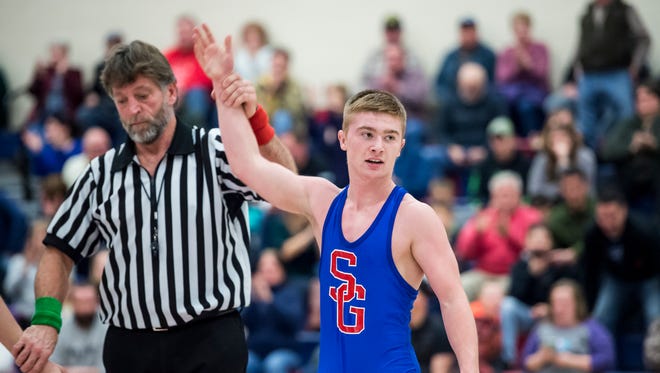 In this file photo, Spring Grove's Dalton Rohrbaugh has his hand raised after defeating Gettysburg's William McElhose during a quarterfinal match in the PIAA District 3 AAA team wrestling tournament at Spring Grove High School on Jan. 30, 2018.