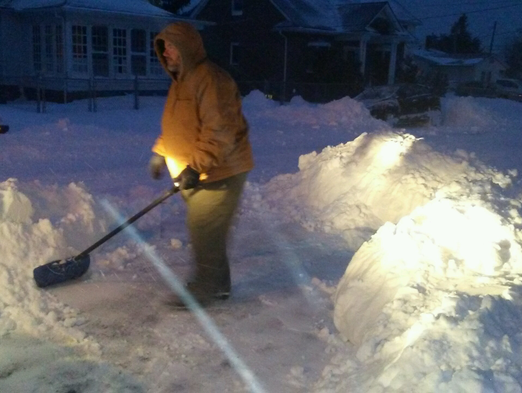 Daniel Ritchie works on clearing some of the snow in