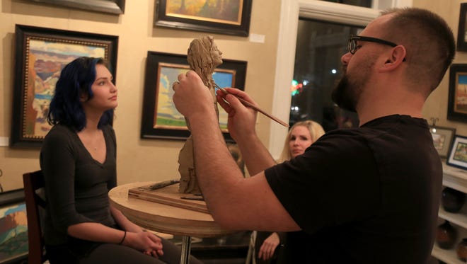 Ben Hammond, an artist from northern Utah, sculpts at The Mission Gallery in St. George during the 2015 Arts to Zion Art and Studio Tour. The tour this year runs from Jan. 14-18.