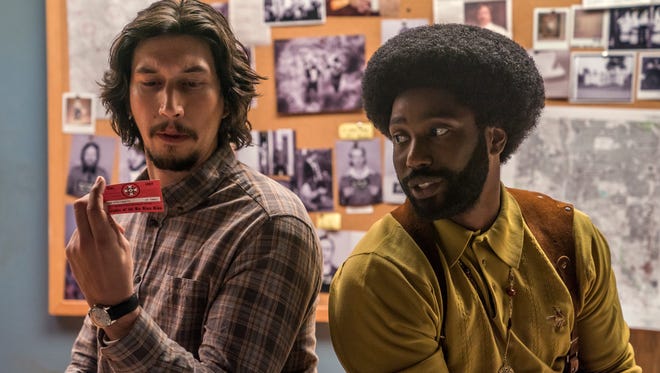 Colorado Springs cops Flip (Adam Driver, left) and Ron (John David Washington) work together to infiltrate the 1970s-era KKK in "BlacKkKlansman."