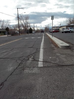 The city of Fernley recently completed a $5.4 million restoration project for Hardie Lane. A potential county increase in commercial development taxes could garner more road funds for the city and county.