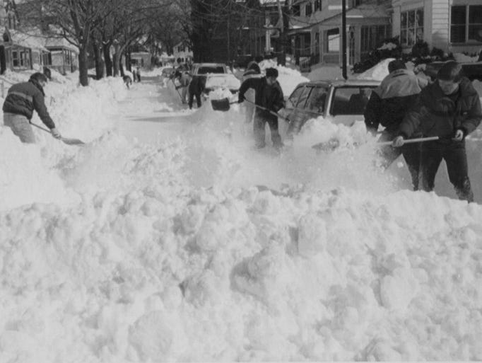 Neighbors try to clear Regent Street during the March