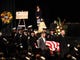 The casket of Jeremy Stoke enters the Redding Civic