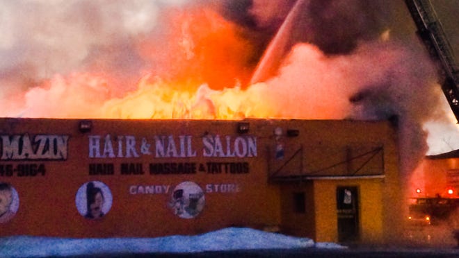 Detroit Firefighters Battle Blaze At Male Strip Club